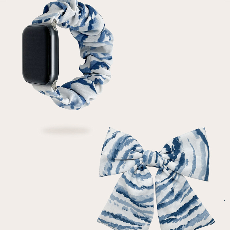 Set plave prugaste narukvice za Apple Watch i gumice za kosu s mašnicom