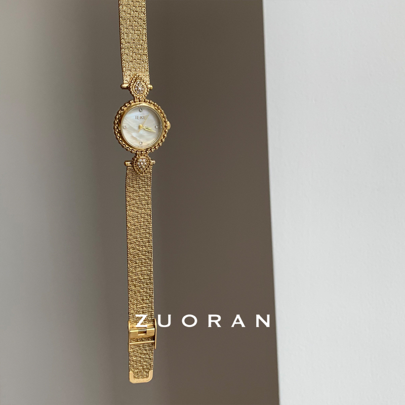 Női karóra perlamutros számlappal és gyémántokkal, retro palota stílus, kvarc mechanizmus, ötvözet tokkal, acél szíj, 30 m vízállóság