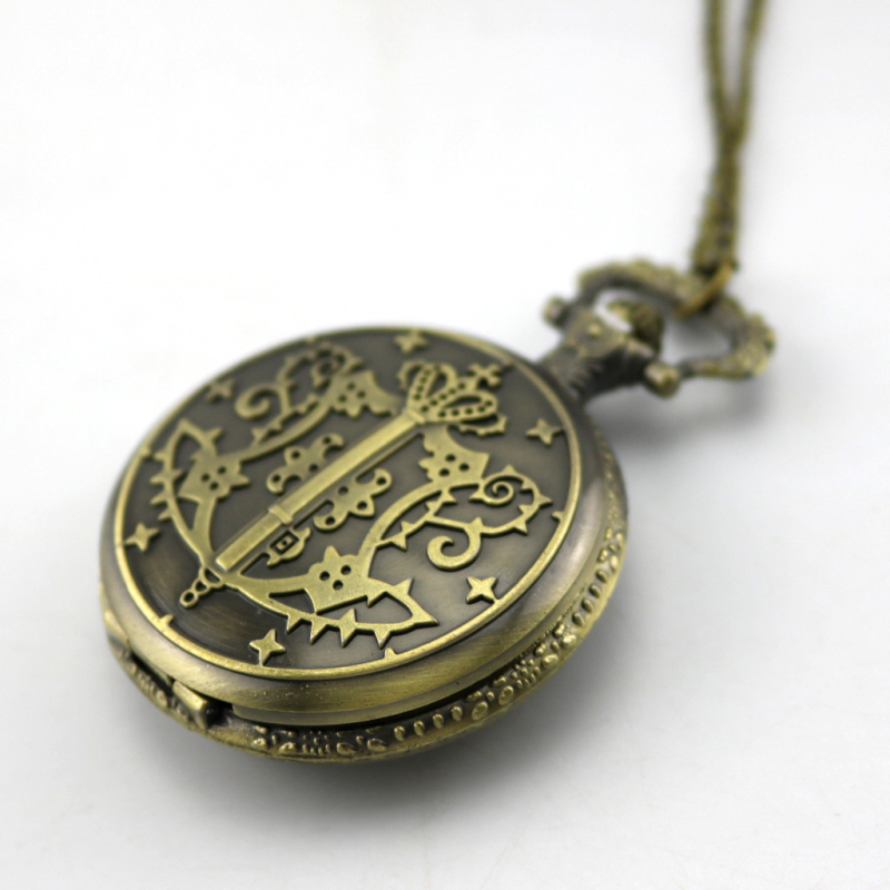 Kabatas pulkstenis ar iekšēju kustību, alvas korpuss, parasts stikla spogulis, karikatūras stils, pielāgota apstrāde