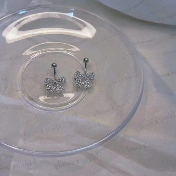 Rankų darbo nerūdijančio plieno bambos nagas su kaspino dizainu — Žiema 2022