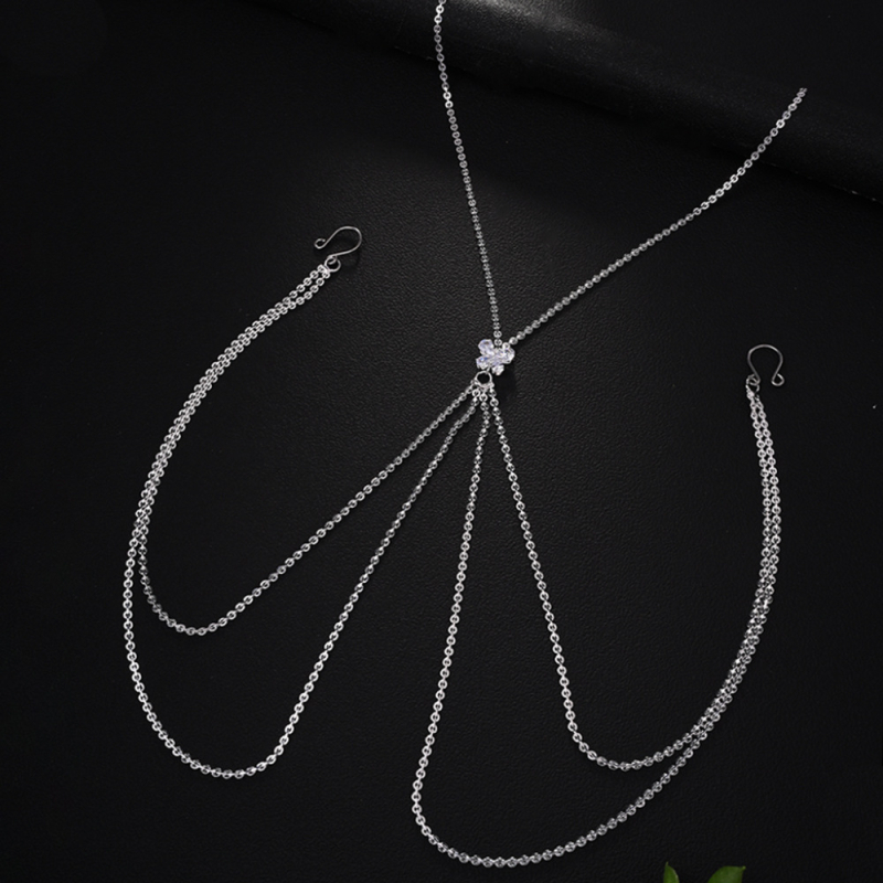 Ötvözetből készült testlánc mesterséges kövekkel kirakott, geometriai kialítás, elektroplakálás, női stílus