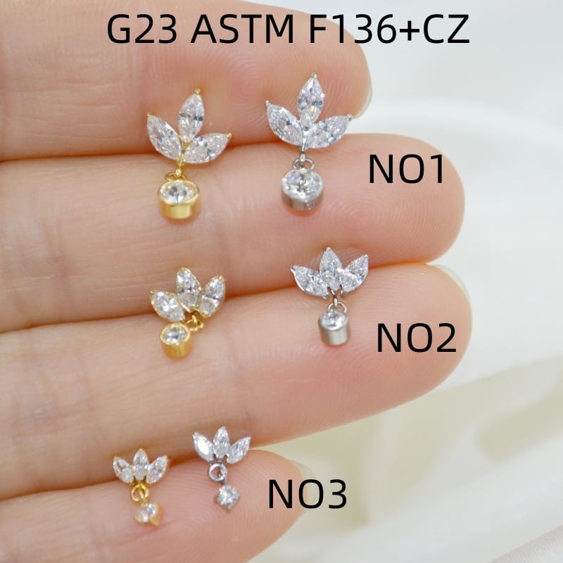 Σκουλαρίκια από τιτάνιο με ενθέσεις ζιρκόνιο, σχήμα φύλλου σφενδάμης, unisex μόδα