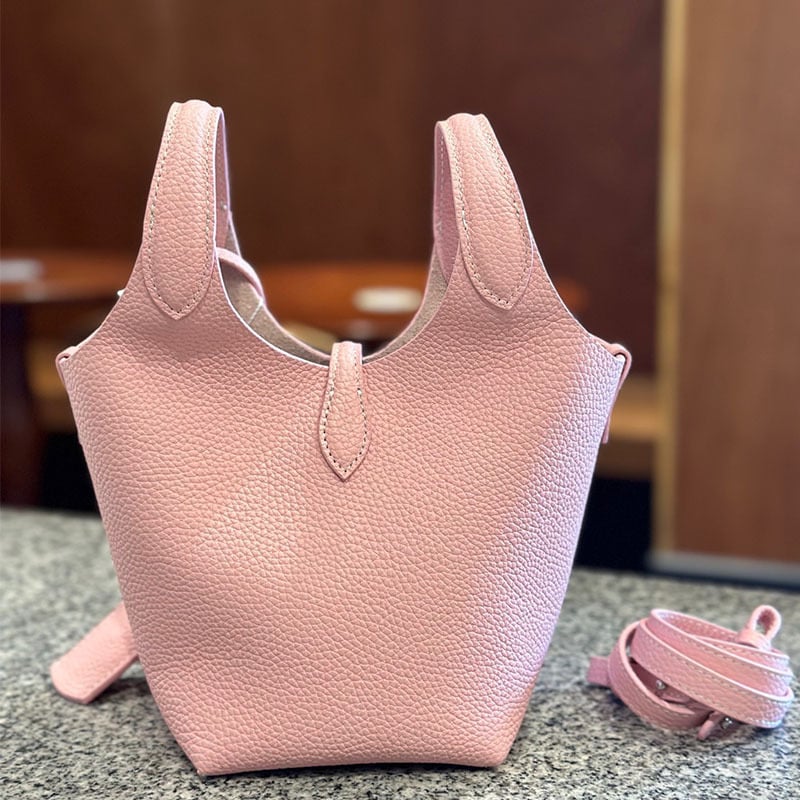 Õiges nahast bucket-kott, esimesest kihist veise nahk, vooder nahk, köisvoldiga sulgemine, sisemine mobiiltelefoni tasku