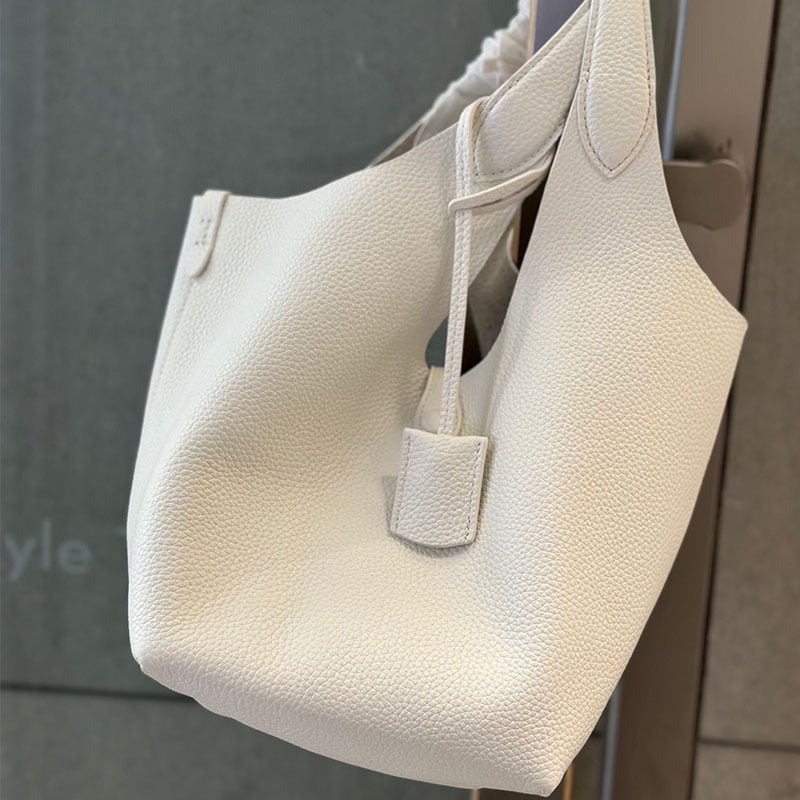 Õiges nahast bucket-kott, esimesest kihist veise nahk, vooder nahk, köisvoldiga sulgemine, sisemine mobiiltelefoni tasku