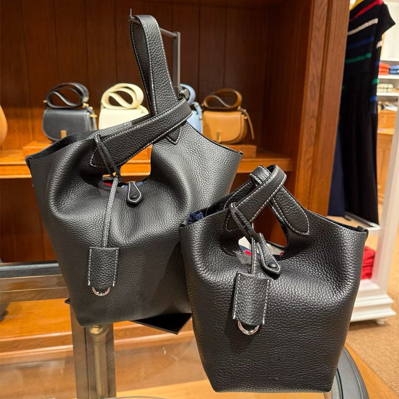 Õiges nahast bucket-kott, esimesest kihist veise nahk, vooder nahk, köisvoldiga sulgemine, sisemine mobiiltelefoni tasku