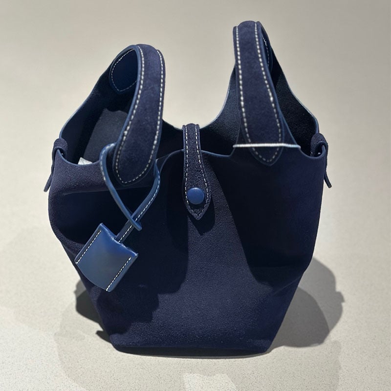 Õiges nahast bucket-kott, esimesest kihist veise nahk, vooder nahk, köisvoldiga sulgemine, sisemine mobiiltelefoni tasku