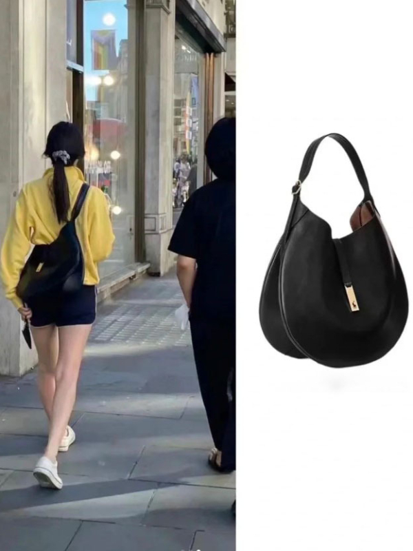 Geantă tote din piele naturală, formă rotundă, închidere cu lacăt, căptușeală din poliester, numeroase buzunare interioare