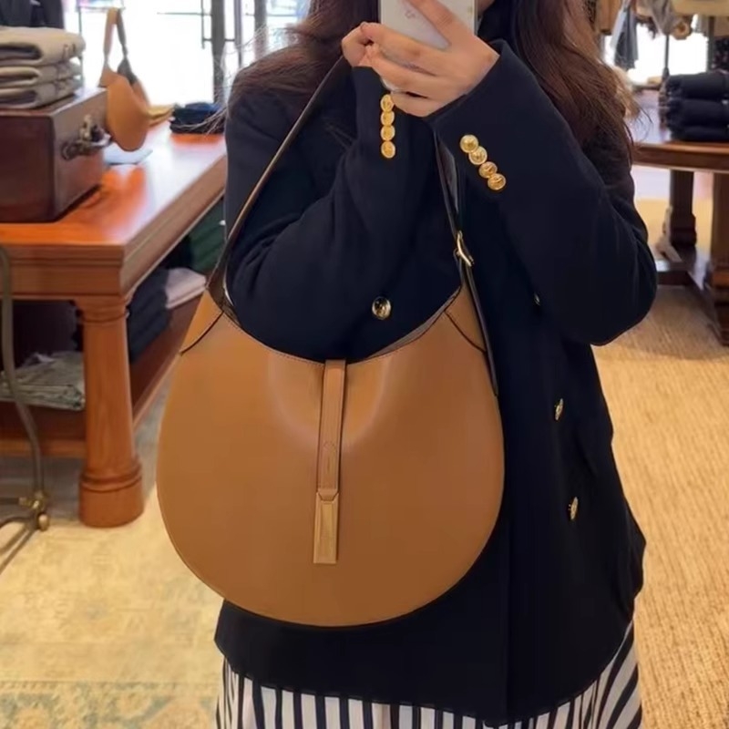 Geantă tote din piele naturală, formă rotundă, închidere cu lacăt, căptușeală din poliester, numeroase buzunare interioare