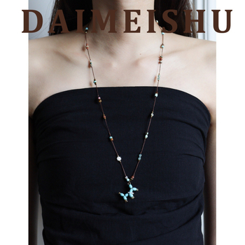 Női nyaklánc tigrisz szem kővel és türkiz medállal, kutya motívummal, fonott pulóverlánccal