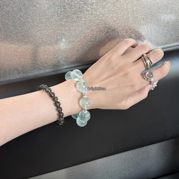 Βραχιόλι από κρύσταλλο, χωρίς πλευρικούς λίθους, με ελαστικό κορδόνι; μεταλλικά εξαρτήματα: κράμα και ασήμι 925; συσκευασία ατομικά συσκευασμένη; στυλ: φρέσκο και κομψό