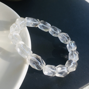 Βραχιόλι με φασετιωμένες κυλινδρικές χάντρες κρυστάλλου, ασύμμετρο σχέδιο