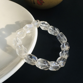 Βραχιόλι με φασετιωμένες κυλινδρικές χάντρες κρυστάλλου, ασύμμετρο σχέδιο