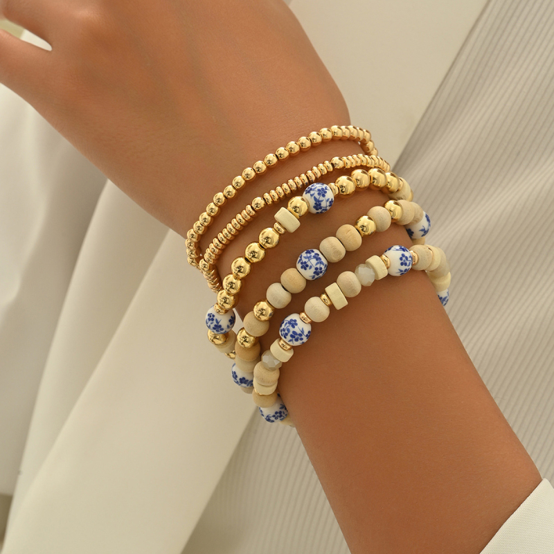 Keraamiline käevõru puidust helmidega, etnilise stiiliga