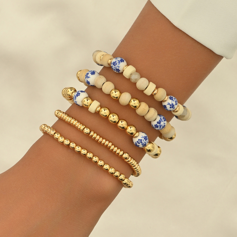 Keraamiline käevõru puidust helmidega, etnilise stiiliga