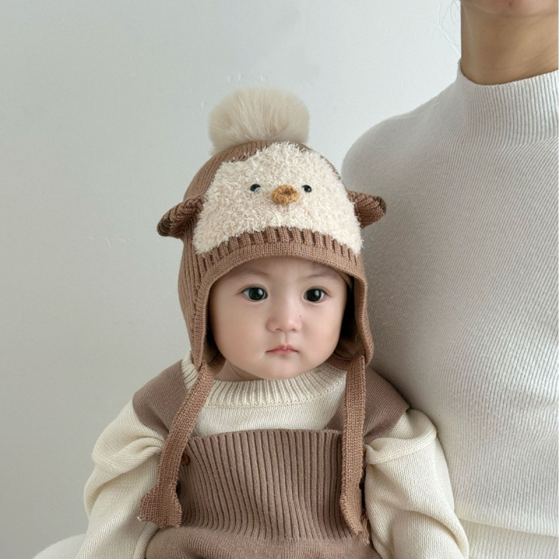 Vilnonė kūdikio kepurė su ausų apsauga – žieminė megztinė, be krašto, apvalus viršus, INS stilius