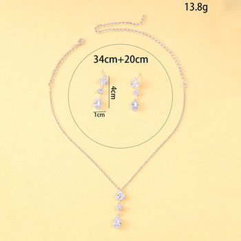 Set ogrlice i naušnica sa cirkonom – elektroplatinirani završetak; motivi: kapljica vode, srce i zvončić; standardni lančić; privjesci od umjetnog kristala