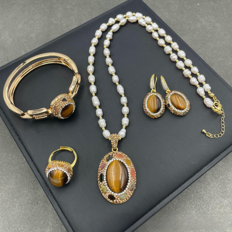 Tigriszem kő ékszerszett — gyémánt beépítés; fülbevalók, nyaklánc és karkötő; márka meiyu; modell 7001