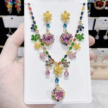 Set ogrlice i naušnica s cvjetnim motivom, luksuzni umjetni kristal i zircon, klavikularni lanac, bakren privjesak, opseg 31–40 cm, originalni dizajn