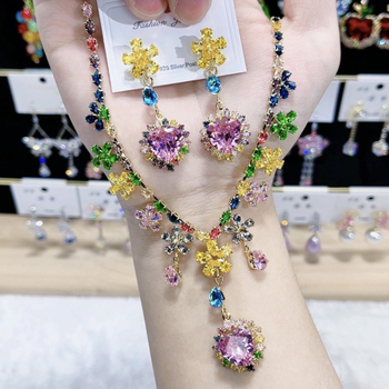Set ogrlice i naušnica s cvjetnim motivom, luksuzni umjetni kristal i zircon, klavikularni lanac, bakren privjesak, opseg 31–40 cm, originalni dizajn