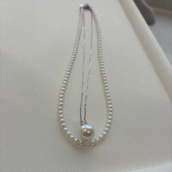 Frissvízi gyöngyökből készült nyaklánc, valódi kerek gyöngyök, ezüst 925, tavasz 2024 (frissvízi gyöngyök; valódi kerek formák; ezüst 925; tavasz 2024)