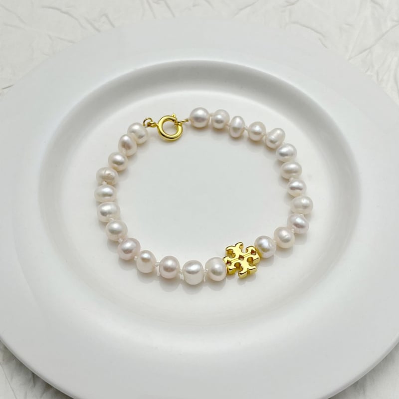 Narukvica s prirodnim perlama u obliku slova, ručno pletena, ženski uredski stil, ljeto 2025