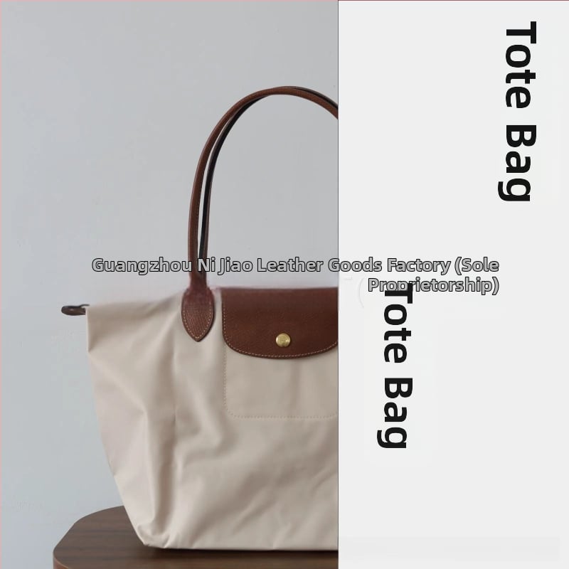 Nailoninė dumpling rankinė su dangteliu — miesto paprastas stilius, vidinės kišenės telefonui ir ID, be peties dirželio