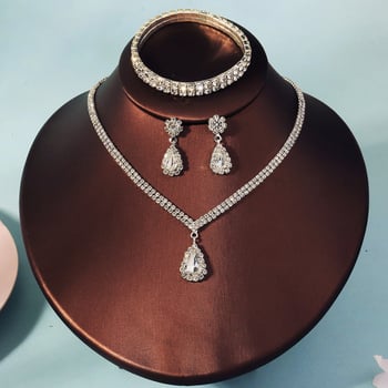 Háromrészes női ékszerszett: nyaklánc, fülbevaló és karkötő; üveg és lazurit lapis lazuli, gyémánt-stílus befejezés; réz medál egy hagyományos láncon; formák: szív, csepp, harang; márka Miallo; 2025 ősz