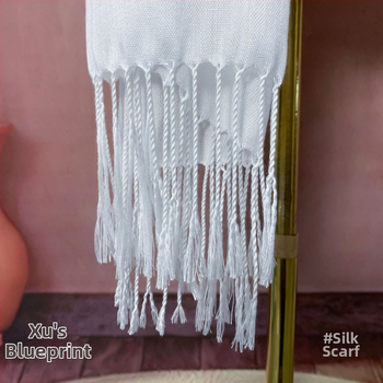 Μαλλινο κασκόλ με φούντες (Υλικό: Μαλλί; Εποχές: Άνοιξη και Φθινόπωρο; Κυκλοφόρηση: Φθινόπωρο 2024)