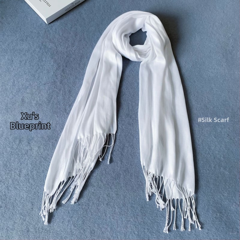 Μαλλινο κασκόλ με φούντες (Υλικό: Μαλλί; Εποχές: Άνοιξη και Φθινόπωρο; Κυκλοφόρηση: Φθινόπωρο 2024)