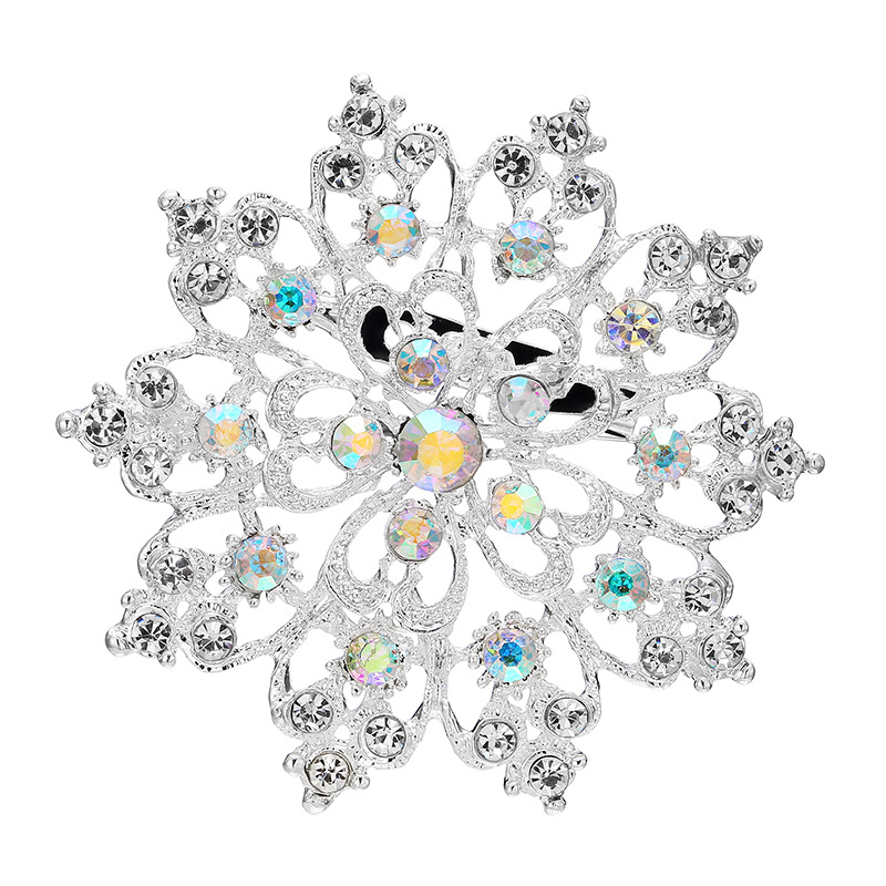 Ötvözetből készült rhinestone napraforgó kitűző koronás motívummal, uniszex