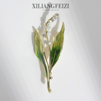 Broșă cu motiv floare liliuța văii, bază de cupru, pietre zirconiu, placare electrolitică