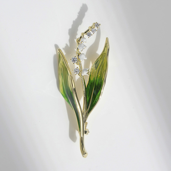 Broșă cu motiv floare liliuța văii, bază de cupru, pietre zirconiu, placare electrolitică