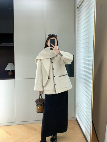 Ženski vuneni kaput s reverom, jednostruko kopčanje, dugi rukavi, debela vuna, duljina 50–65 cm