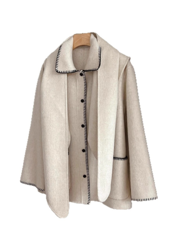 Ženski vuneni kaput s reverom, jednostruko kopčanje, dugi rukavi, debela vuna, duljina 50–65 cm