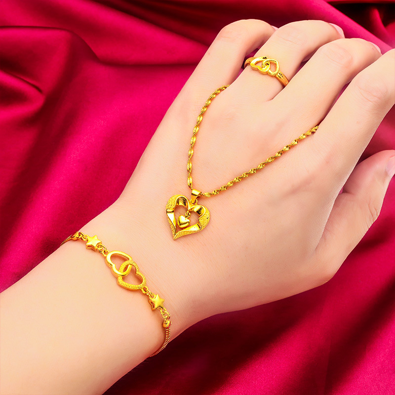 Set nakita: ogrlica i narukvica od mesinga sa spiralnim lancem, elektroplatiranje, privjesak od mesinga, uzorci: srce, kapljica vode, zvončić