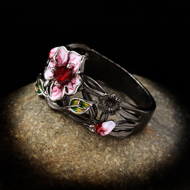 Gotski bakreni set nakita s cvjetnim motivom: naušnice, ogrlica i narukvica, križni lanac i ugradbeni od mješovitih kamenčića