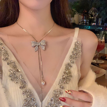 Vintage lanac za džemper s rhinestones mašnicom, ručno pleteno, proljeće 2025