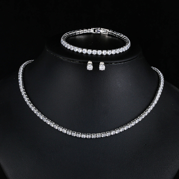 Комплект бижута от три части: колие с кръгъл цирконий на бамбукова верижка с обици и гривна; материал: мед и цирконий, електроплатина; вложки от смесени камъни; мотиви звезди, слънце и луна, вселена