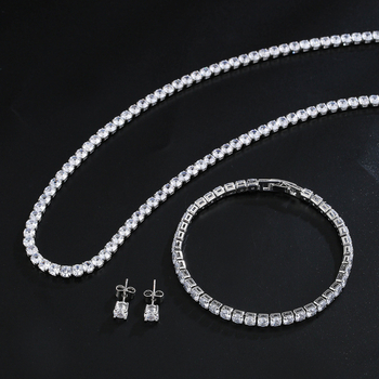 Комплект бижута от три части: колие с кръгъл цирконий на бамбукова верижка с обици и гривна; материал: мед и цирконий, електроплатина; вложки от смесени камъни; мотиви звезди, слънце и луна, вселена