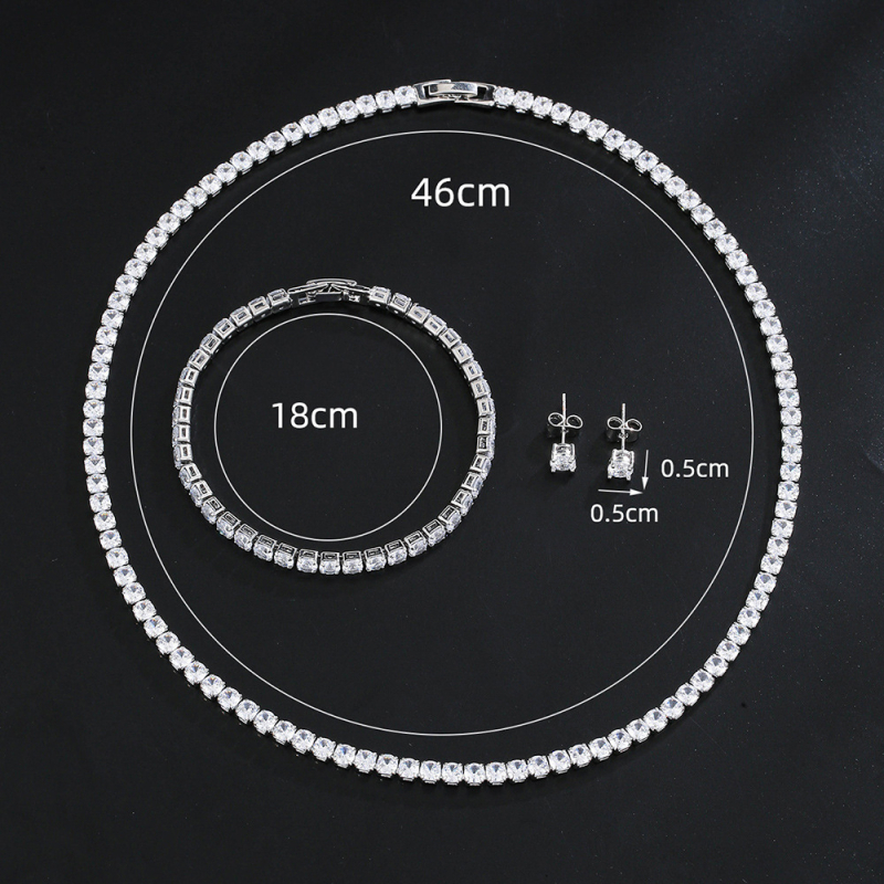 Комплект бижута от три части: колие с кръгъл цирконий на бамбукова верижка с обици и гривна; материал: мед и цирконий, електроплатина; вложки от смесени камъни; мотиви звезди, слънце и луна, вселена