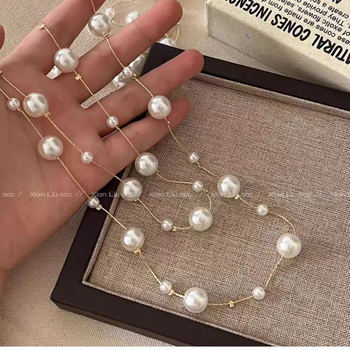 Garā džempera kaklarota – no plastmasas/rezīna materiāla, U forma, plaida raksts, bumbiņu ķēde