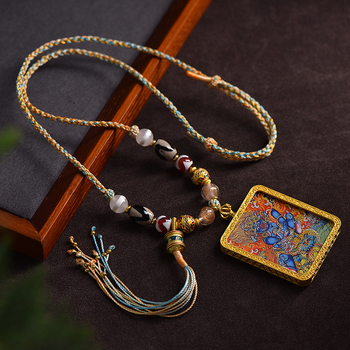 Uniszex hosszú nyaklánc tibeti etnikus stílusban, kézzel készített fonatolt zsinór Dzi gyöngyökkel, buddhista amulett és méhviasz Thangka medál