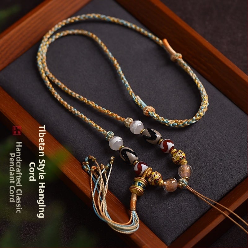 Uniszex hosszú nyaklánc tibeti etnikus stílusban, kézzel készített fonatolt zsinór Dzi gyöngyökkel, buddhista amulett és méhviasz Thangka medál