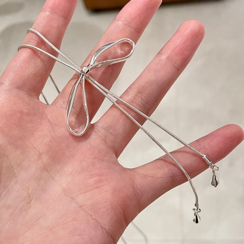 Ogrlica u obliku mašne, mješavina materijala, elektroplatiranje, marka Butterfly, lanac za džemper