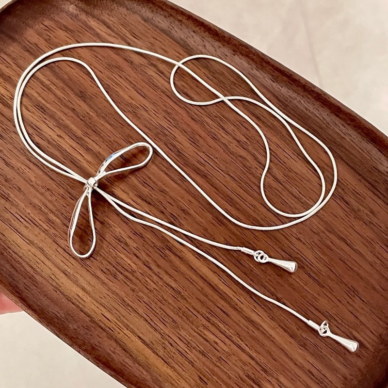 Ogrlica u obliku mašne, mješavina materijala, elektroplatiranje, marka Butterfly, lanac za džemper