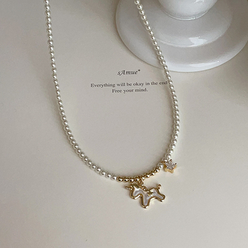 Nauš s višeslojni geometrijski lanac i privjeskom od majčine biserne perle s motivom jednoroga i zvijezde, elektropoliran metal