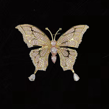 Réz alapú pillangó bross cirkóniával díszített, női divat kiegészítő, fémbe bevonva