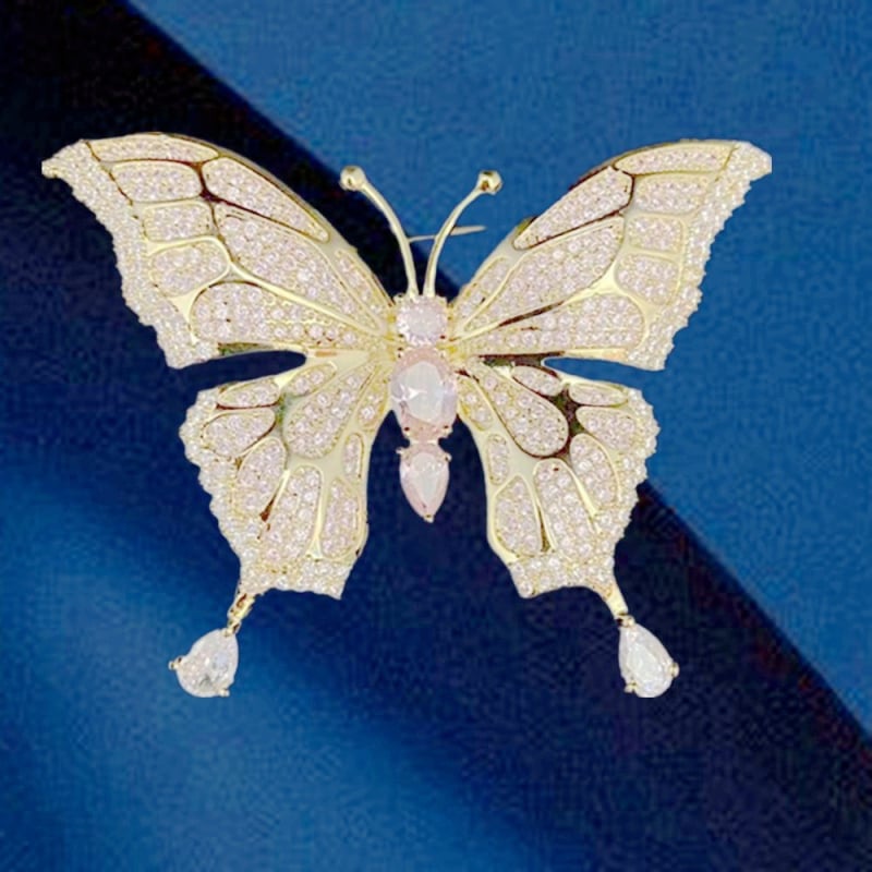 Réz alapú pillangó bross cirkóniával díszített, női divat kiegészítő, fémbe bevonva