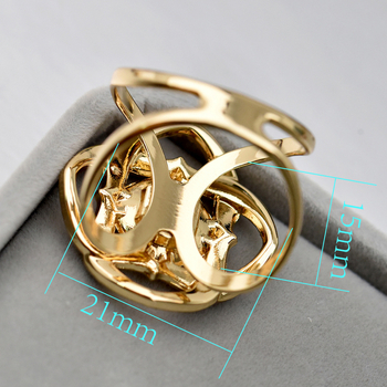 X formájú sálkapocs, ötvözetes anyag, kristály mozaik, virágmotívumok, elektroplakált felület, 2023 tavasz kollekció.