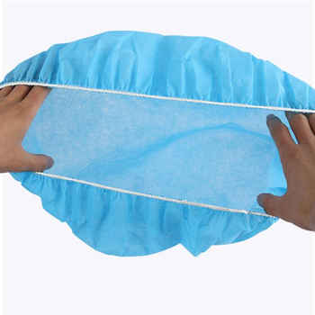 Vienkartinė PP nepluošto plaukų kepurė apvali, kvėpuojanti ir dulkių atspari; 20 g/m²; pakuotė 100 vnt.; tinkama maisto pramonei, elektronikai ir švarioms patalpoms